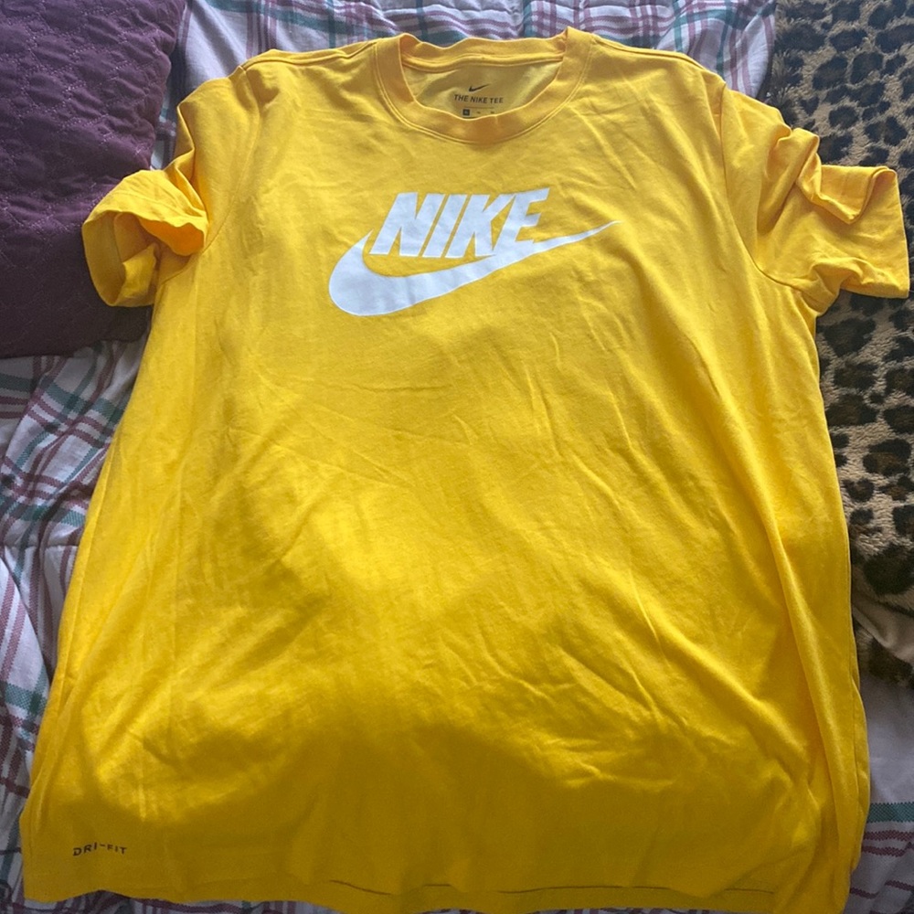 Yellow short sleeve Nike shirt. NWT. Size XL